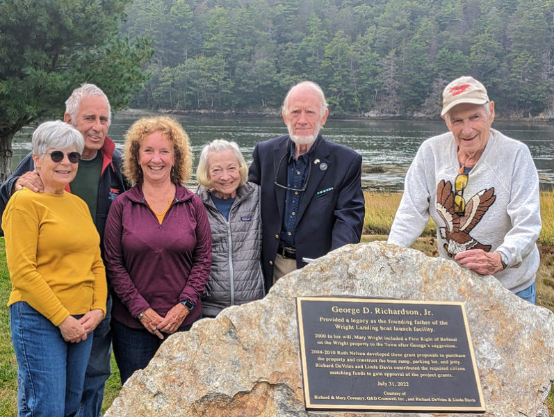 Westport Island residents gather at the Wright Landing on Saturday, Sept. 30 to unveil a plaque honoring former select board member George Richardson Jr. and Ruth and John Nelson for their work developing the project. From left: Sandy Ballard, former Wright Landing Committee Chair Art Ballard, Sheree Nelson, representing the Nelson family; Linda Davis, Wright Landing Committee Chair Richard DeVries, and George Richardson Jr. (Photo courtesy Gaye Wagner)