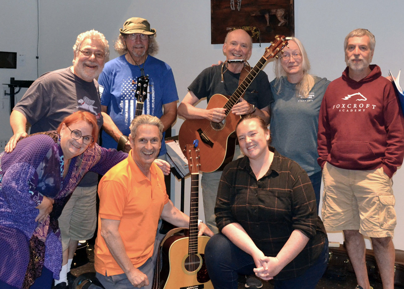 The cast of River Company's production of "Woody Guthrie's American Song." Front row, from left: Ellie Busby, John Monterisi, and Erin Barton. Back row, from left: Nick Azzaretti, CapÂ’n Frank Bedell, Gary McCue, Ella Ackerman, and Sumner Richards III. (Photo courtesy River Company)