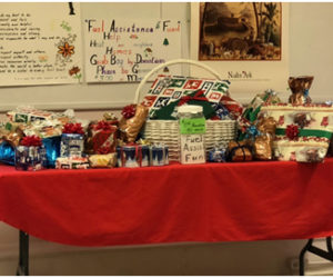 A grab bag table of beautifully wrapped Christmas items is available at the Edgecomb Community Churchs thrift store for a minimum $3 donation to the Boothbay Harbor Fuel Assistance Fund. (Courtesy photo)