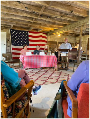 From left: Audrey Hufnagel, John Hagan, and Steve Ward participate in a recent Conversation Circle event at Inn Along the Way. (Photo courtesy Inn Along the Way)