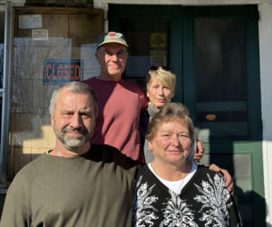 From left: Steve Brackett, B.J. Russell, Lori Crook, and Karen Brackett, stand on the front steps of King Ro Market in Round Pond on Monday, Nov. 13. Steve Brackett has purchased and plans to reopen the business before Christmas. (Johnathan Riley photo)