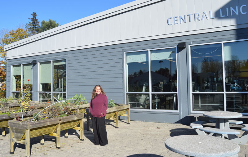 Karen-Ann Hagar-Smith stands outside of the Central Lincoln County YMCA in Damariscotta. As director of outreach and community navigation, Hagar-Smith specializes in coming up with creative ways to address community needs. (Molly Rains photo)