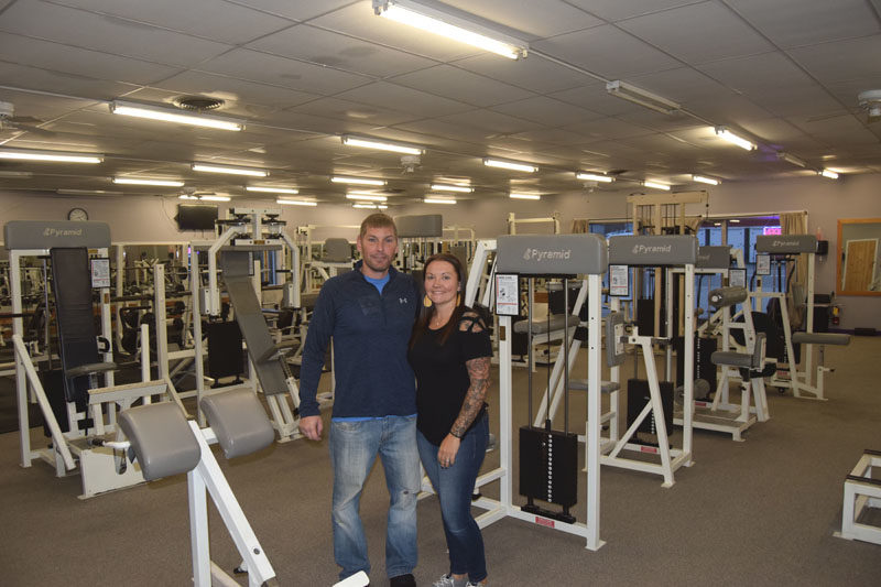 Shayne and Stephanie Reichard stand in Panther's Gym in Waldoboro. As new owners of the gym, Reichards hope it will become a community hub. (Molly Rains photo)