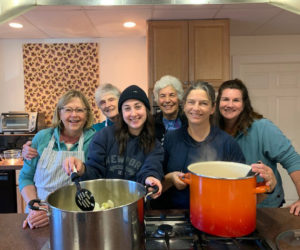 Volunteers make applesauce for Healthy Lincoln County share tables. (Photo courtesy Healthy Lincoln County)