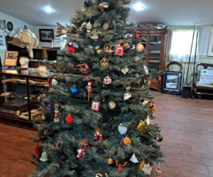 The Christmas tree at the Waldoborough Historical Society museum with the ornaments that have been placed on it through the years. (Photo courtesy Waldoborough Historical Society)