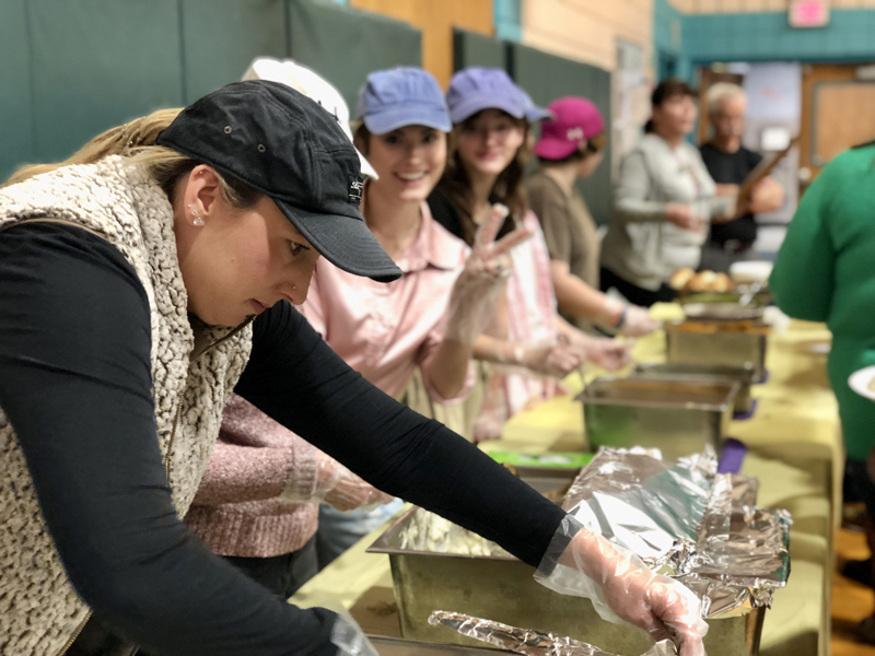 With help from eighth graders, the Nobleboro Central School kitchen staff prepare for the school's Thanksgiving feast on Nov. 17. (Photo courtesy Nobleboro Central School)