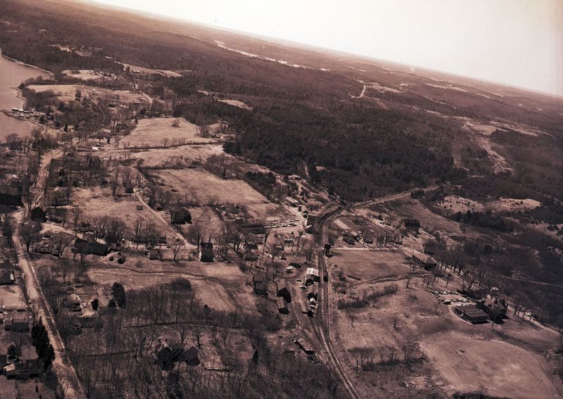 This picture shows the path of the fire in the vast unbroken space between River Road and the former Hopkins Hill Road. The uncontrolled fire raced toward Academy Hill Road, near the center of the picture, threatening the businesses and the houses there. The help provided by additional manpower proved vital, like the boys from Lincoln Academy who walked into areas where the fire trucks could not drive. (Photo courtesy Newcastle Historical Society Museum)