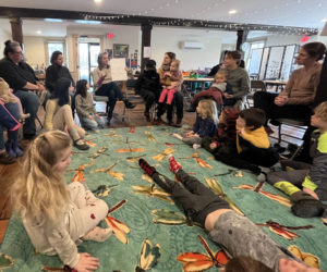 A Community Literacy event at the Merry Barn Writers Retreat in Edgecomb brings people together through read-alouds, engaging projects, and tasty treats. (Photo courtesy Merry Barn)
