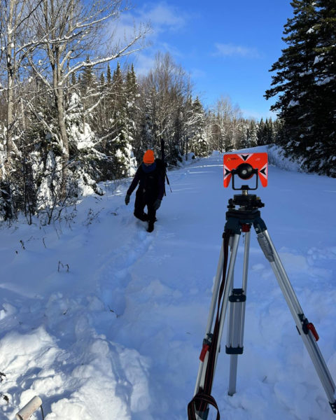 The SurveyScapes team at work in Rangeley in December. The company owned and operated by longtime friends serves all of Maine, though most customers are in the Midcoast. (Courtesy photo)