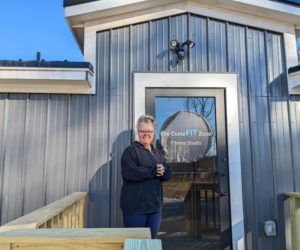 Stacy Gogolinski stands outside The ComeFit Zone, her fitness studio in Jefferson, on Friday, Jan. 5. Since reopening the gym at the beginning of 2024, Gogolinski said she is looking forward to "seeing familiar faces, meeting new people, and building community." (Molly Rains photo)