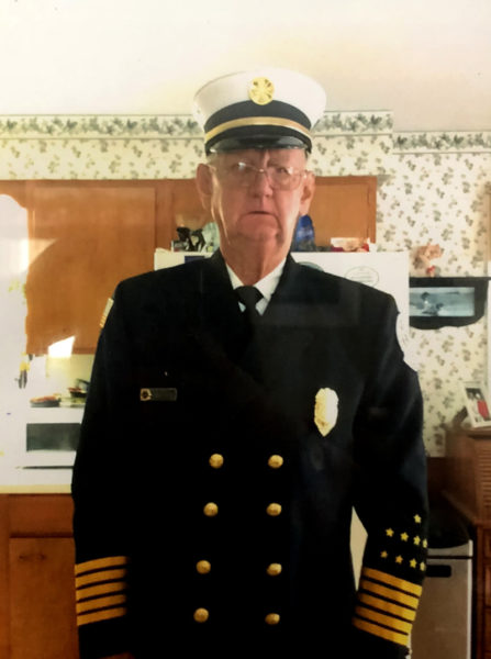 James "Jimmy" Hall wears his firefighter's dress uniform for the Damariscotta Fire Department in 2022. Hall has been a member for decades and held a senior leadership position for 30 years. I try to give back with the fire department stuff, he said. I tried to give back what I could and help out. (Courtesy photo)