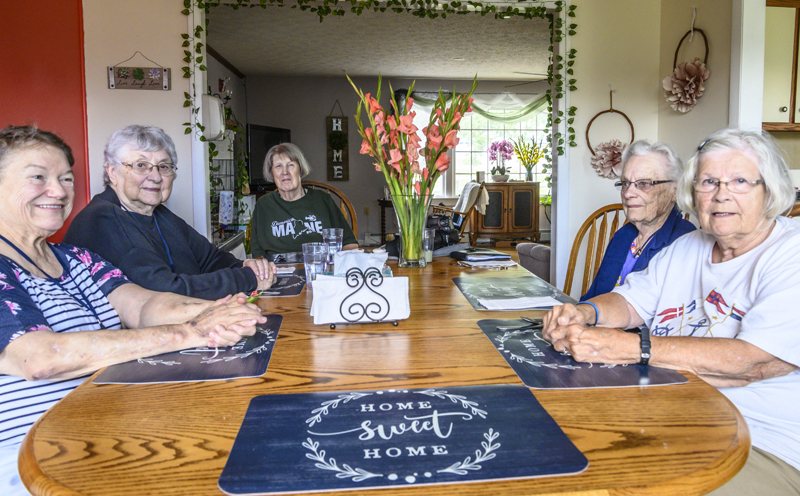 Residents of the Jefferson Green share a meal on Aug. 1. Communal mealtimes provide an opportunity for residents to enjoy the social connection that is one of the key aspects of engaged aging. (Bisi Cameron Yee photo)