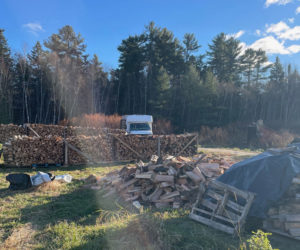 Thanks to some steadfast volunteers, the Bristol-South Bristol Transfer Station, and N.C. Hunt, a cache of neatly stacked firewood stands at the ready for the next call. (Photo courtesy Community Housing Improvement Project)