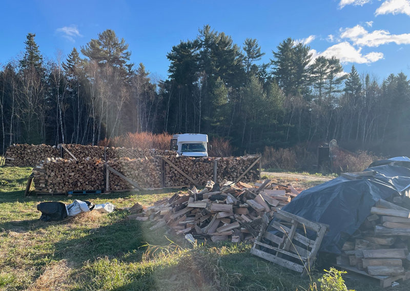 Thanks to some steadfast volunteers, the Bristol-South Bristol Transfer Station, and N.C. Hunt, a cache of neatly stacked firewood stands at the ready for the next call. (Photo courtesy Community Housing Improvement Project)