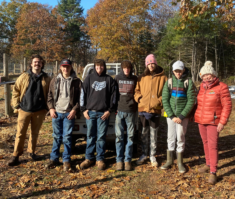 Students and teachers involved in Lincoln AcademyÂ’s IDEAL program pause on the Veggies-to-Table farm in Newcastle last fall. (Photo courtesy Erica Berman)