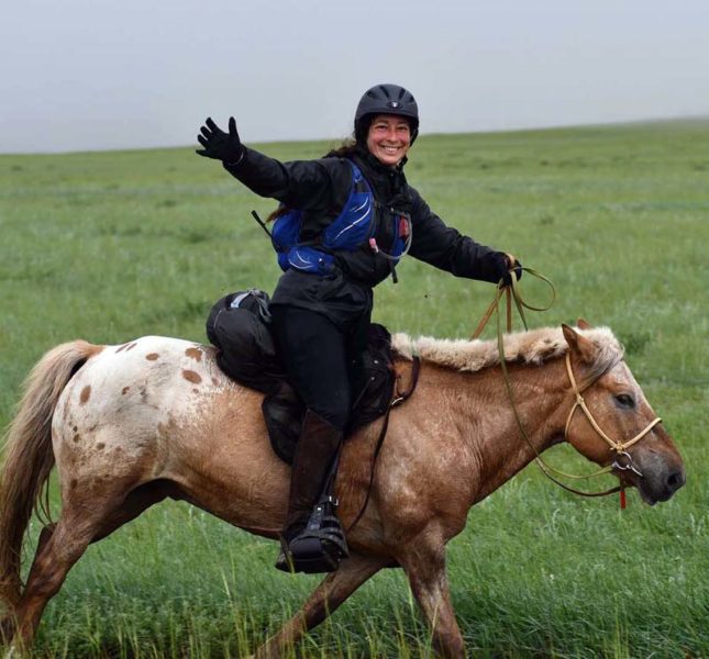 Jessie Dowling rides across Mongolia during the Mongol Derby in August 2023. (Photo courtesy Jessie Dowling)