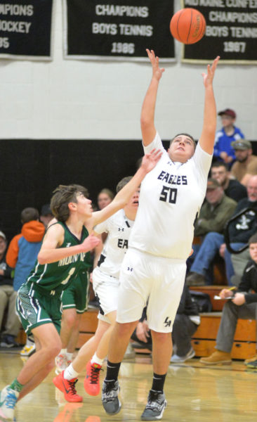 Tyson Ball steals the ball for the Eagles. (Paula Roberts photo)