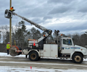 The last segment of fiber-optic cable is put up by employees of Tidewater Telecom Inc. along Crabapple Drive in Bremen. Bremen's fiber-optic broadband project, which started in 2019, was completed with the final installation on Jan. 23, 2024, bringing high-speed internet accessibility to all mainland Bremen residents. (Photo courtesy Jane Carroll)