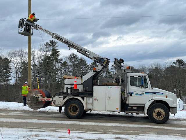 The last segment of fiber-optic cable is put up by employees of Tidewater Telecom Inc. along Crabapple Drive in Bremen. Bremen's fiber-optic broadband project, which started in 2019, was completed with the final installation on Jan. 23, 2024, bringing high-speed internet accessibility to all mainland Bremen residents. (Photo courtesy Jane Carroll)