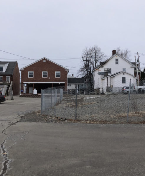 Bangor Savings Bank has pulled an application to the town of Damariscotta for construction of a small park on about 20 feet of its parking lot behind its downtown location. A bank representative said the decision was made due to unclear public access rights in the parking lot and the uncertainty that the town could later accept a land donation there to provide a public launch with access to Great Salt Bay. (Elizabeth Walztoni photo)
