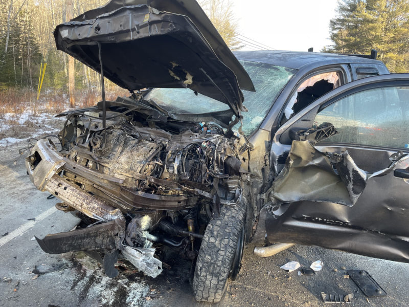 One of the two pickup trucks involved in a collision on Route 27 in Edgecomb Thursday morning, Feb. 8, shows extensive damage. Both operators involved were transported from the scene for medical care. (Sherwood Olin photo)