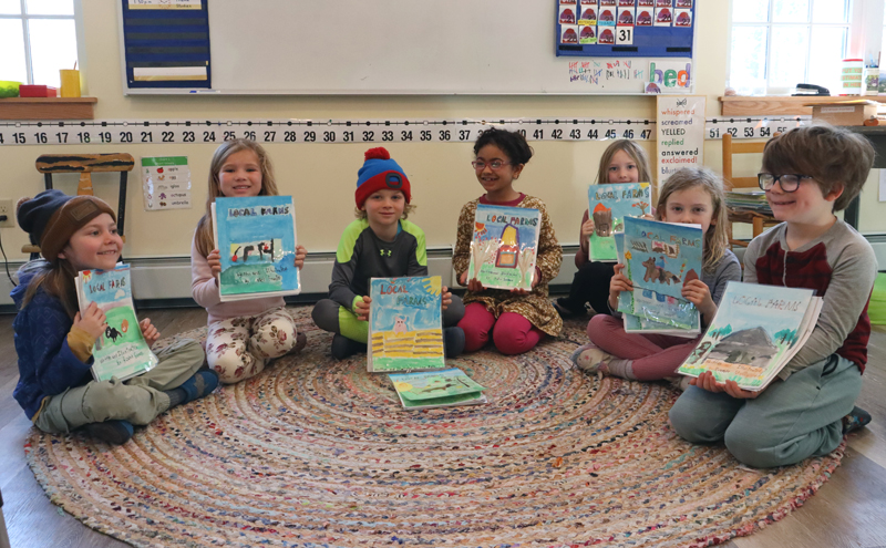 Children from Lorna Fake's class at Brightfield School in Bath pose with their Â“Local FarmsÂ” books, a project the class has been taking part in with the help of a Maine Agriculture in the Classroom grant Fake applied for in August 2023. (Piper Pavelich photo)