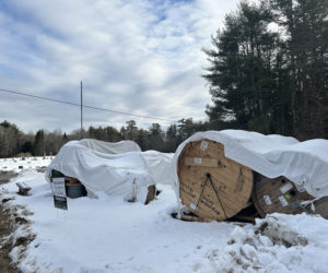 Fiberglass cables draped in tarps outside the Somerville town office on Monday, Feb. 5. This spring or summer, construction will begin on the town's municipal broadband network, according to members of the Somerville Municipal Broadband Board. (Molly Rains photo)