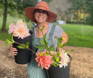 Stephanie Cheney of the Tipsy Butler with some Veggies to Table dahlias. (Photo courtesy Erica Berman)