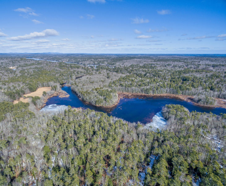 An aerial view of the Pemaquid River southwest of Biscay Pond, with Keyes Woods Preserve in the foreground. (Photo courtesy Coastal Rivers Conservation Trust)