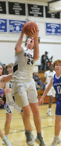 Otto Schoenthal grabs a rebound for Lincoln Academy. (Paula Roberts photo)