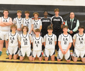 The Lincoln Academy JV boys basketball team finished the season undefeated. Front row, from left: Team members Jacob Hedrick, James Wyman-Benner, Paul Leeman, James Hanley, Joshua Ward, and Malachi Farrin. Back row, from left: Shawn McFarland, Chase Ober, Abe Guilford, Terry Welle, Otto Schoenthal, and coach Rand Maker. Not pictured: Michael Mitchell. (Paula Roberts photo)