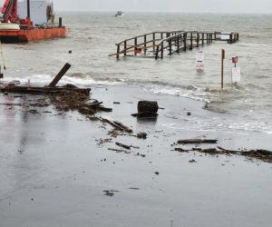 Water overtakes the dock in Round Pond during the January storms. (Photo courtesy Lori Crook)