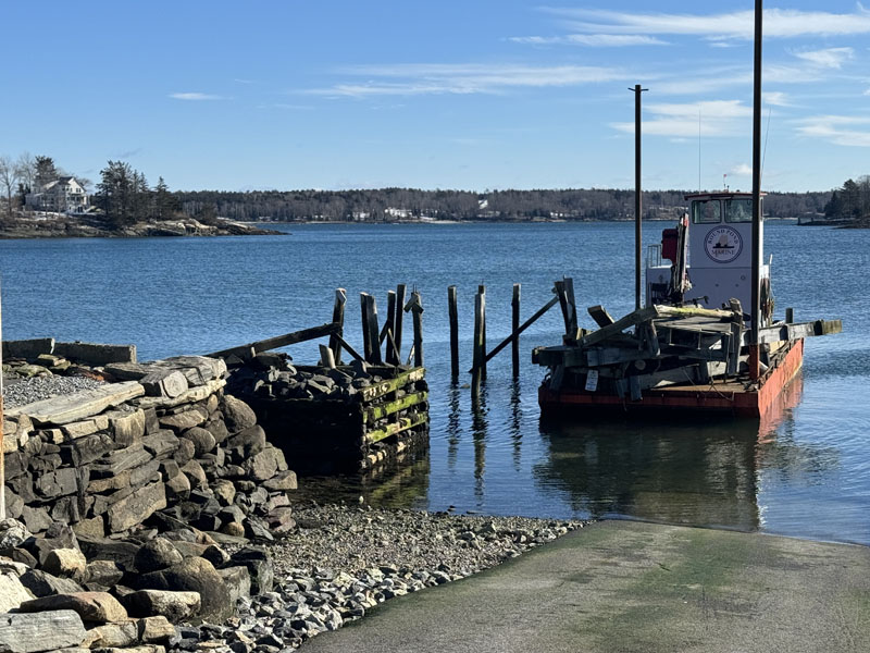 A dock in Round Pond in the middle of demolition on Feb. 3 after the structure was damaged in the Jan. 10 and Jan. 13 storms. (Johnathan Riley photo)