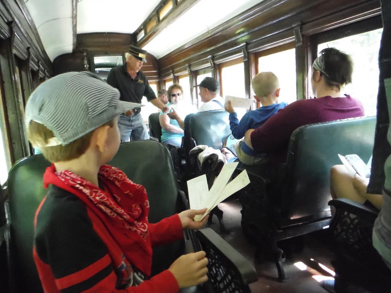 Passengers aboard the Wiscasset, Waterville and Farmington Railway. (Photo courtesy WW&F Railway Museum)