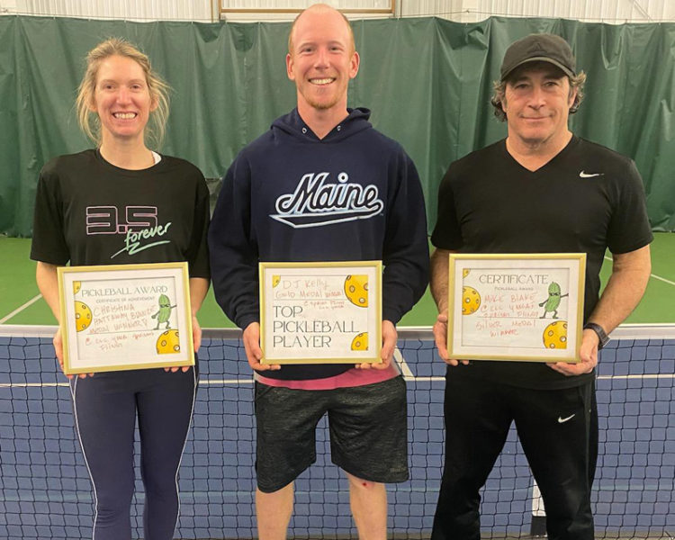 D.J. Kelly (center) won the singles title at the CLC YMCA Spring Fling Pickleball Tournament. Michael Blake (right) won silver and Christina Hattaway won bronze. (Mic LeBel photo)