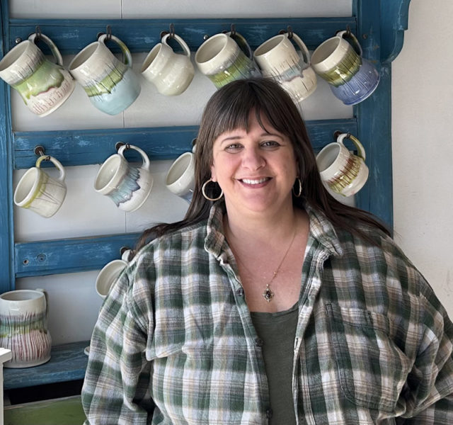 Newcastle potter and art teacher Liz Proffetty stands by her handmade mugs on the morning of Monday, April 15, in her Damariscotta ceramics studio Neighborhood Clay. "Clay is infinitely complicated," Proffetty said. "There is an endless learning curve." (Molly Rains photo)