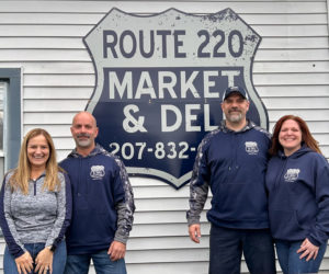From left: Jane Oliver-Gravel, Gary Gravel, Randy Merchant, and Heather Merchant, new owners of Route 220 Market & Deli in Waldoboro, stand on the porch of the business they acquired in early April. Brothers Gravel and Randy Merchant, who met for the first time several years ago, said it's a long-held dream to work together on a project like this. (Molly Rains photo)