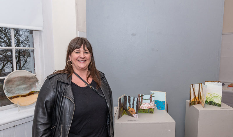 Japanese-style accordion pop-up books by Wiscasset K-6 art teacher Liz Proffety open up to reveal her delicate paintings. (Photo courtesy Bob Bond)