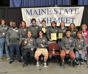 The Maine School of Science and Mathematics ivory math team. Front row, from left: Math teacher Emmanuel Nsadha, Charley Reischer, Gabe Austin, Lochlan O'Connor, and Ari Anghel. Back row, from left: Math teacher Dr. Henry Kavle, Quinn Smith, Graham Reichert, Thomas Nonken, Rye Hughes, Asher Labbe, Quinn Daly, Elizabeth Rethman, and math teacher Vanda Madore. (Photo courtesy Maine School of Science and Mathematics)