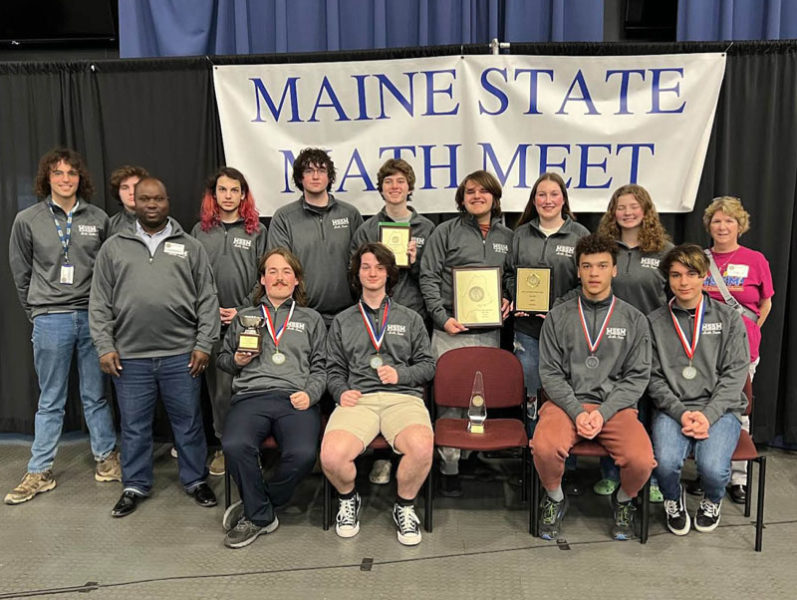 The Maine School of Science and Mathematics ivory math team. Front row, from left: Math teacher Emmanuel Nsadha, Charley Reischer, Gabe Austin, Lochlan O'Connor, and Ari Anghel. Back row, from left: Math teacher Dr. Henry Kavle, Quinn Smith, Graham Reichert, Thomas Nonken, Rye Hughes, Asher Labbe, Quinn Daly, Elizabeth Rethman, and math teacher Vanda Madore. (Photo courtesy Maine School of Science and Mathematics)