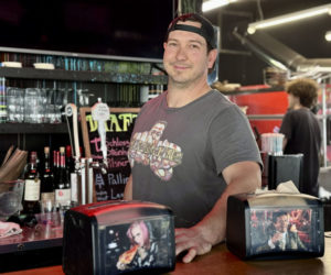 Nick Krunkkala stands the bar in his restaurant, Oysterhead Pizza Co., located at 189 Main St. in Damariscotta on Tuesday, May 21. Krunkkala is a lifelong cook, sports enthusiast, and pop-culture connoisseur originally from Cape Elizabeth who has lived in Damariscotta for nearly a decade. (Johnathan Riley photo)