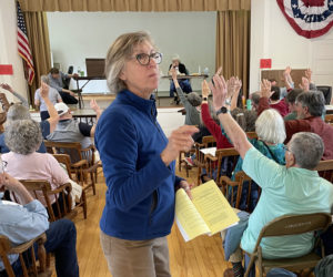 Ballot clerk Paula Swetland counts votes during Edgecomb's annual town meeting Saturday, May 18. Following an extended debate, residents narrowly agreed to create a full time fire chief position, voting with a show of hands, 33-31. (Sherwood Olin photo)