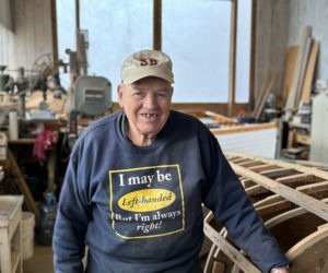 Cecil Burnham stands in his South Bristol boat shop, Shew and Burnham, on Thursday, May 9. Burnham retired from the position of South Bristols harbormaster in March, after 35 years of involvement with the towns harbor management. (Johnathan Riley photo)