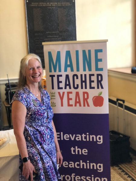 Wiscasset Elementary School teacher Becky Hallowell stands in the Hall of Flags in Augusta on Thursday, May 9 before she was named Lincoln County Teacher of the Year. (Photo courtesy Becky Hallowell)