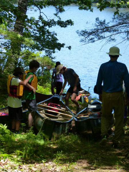 Visitors get ready to launch canoes on Little Dyer Pond. (Photo courtesy Midcoast Conservancy)