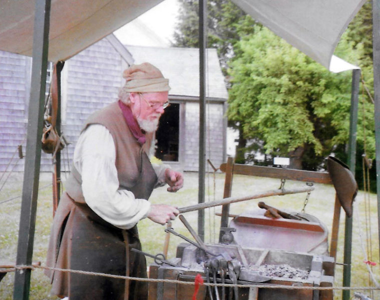 Jeffrey Miller works at his temporary forge during a blacksmith demonstration at the 1754 Chapman-Hall House in Damariscotta. (Photo courtesy Lincoln County Historical Association)