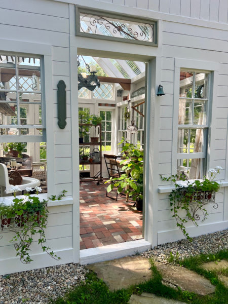 One of the properties on Lincoln County Historical Association's garden tour this year includes this delightful potting shed, constructed by the owner from many vintage windows. (Photo courtesy Lincoln County Historical Association)