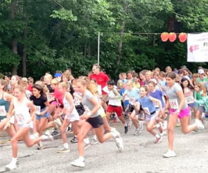 The starting line is a mass of humanity at the Healthy Kids' Strawberry Shortcake Shuffle in 2023. The event returns for a 19th year Saturday, July 19. (Courtesy photo)