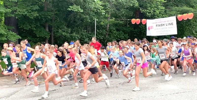 The starting line is a mass of humanity at the Healthy Kids' Strawberry Shortcake Shuffle in 2023. The event returns for a 19th year Saturday, July 19. (Courtesy photo)