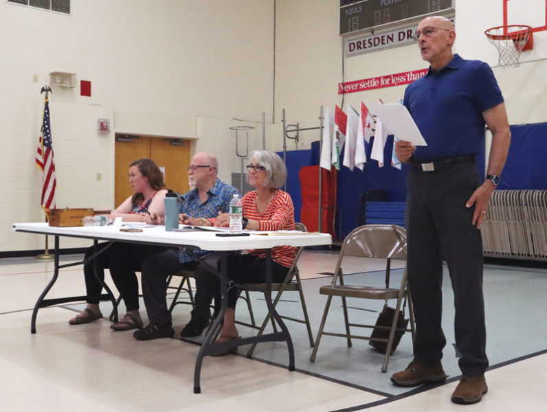 From left: Dresden Town Administrator Nicole Rogers, Dresden Select Board members Don Gleason and Lisa Hewitt, and town meeting moderator Richard Ross at Dresden's annual town meeting the evening of Tuesday, June 18 in the Dresden Elementary School gym. (Piper Pavelich photo)